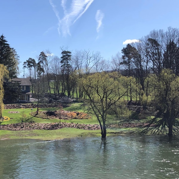 The trail winds through scenic landscapes, offering cyclists picturesque views of the surrounding countryside, including rolling hills, lush greenery, and wildlife habitats.