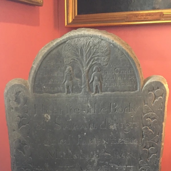 The headstone is rare, one of the first detailed with Biblical images, not usually associated with the Puritans of the time.