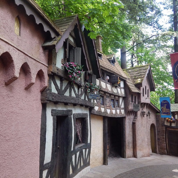 Storybook Lane features iconic scenes from classic tales like Alice in Wonderland and Mother Goose.