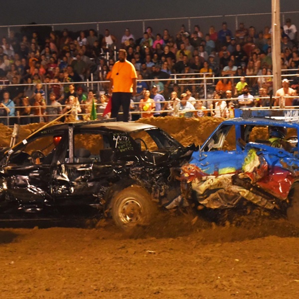 A popular event at the Obion County Fair is the demolition derby, where drivers compete by crashing their cars into each other until only one vehicle remains operational.
