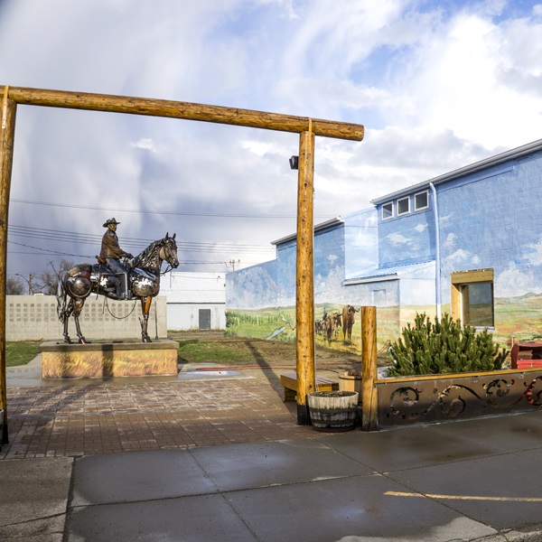 Stroll through the quirky Boss Cowman Square, featuring sculptures and murals celebrating the town's ranching heritage.