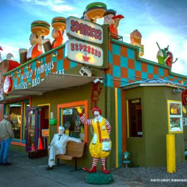 Sparky's is a quirky roadside attraction and barbecue joint, known for its eclectic decor, green chile cheeseburgers, and other chile-infused dishes. 