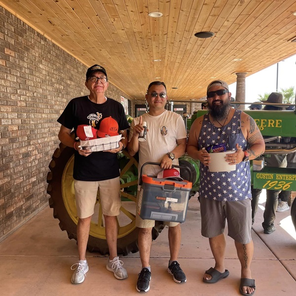 Amateur and professional chefs compete in the festival's chile cook-off, creating innovative dishes featuring Hatch green chile, including chile rellenos and chile cheeseburger. 