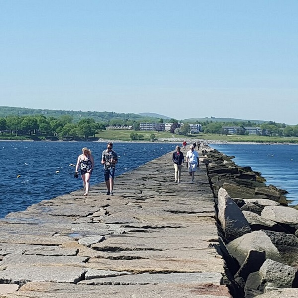 Rockland's breakwater, built in the 19th century, is important to the commercial fishing industry and continues to draw tourists and locals alike. 