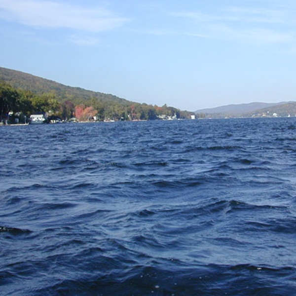 Greenwood Lake is surrounded by scenic beauty, with wooded shores, rocky outcrops, and serene coves that provide a tranquil backdrop for fishing. 