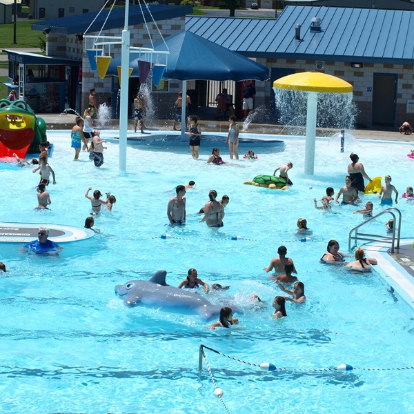 Families can cool off and have fun at the Eldon Aquatic Center, a modern facility with water slides, splash pads, and swimming pools. 