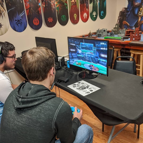 Customers can try out games in the store's play area before deciding to purchase them, ensuring they know what they're getting into. 