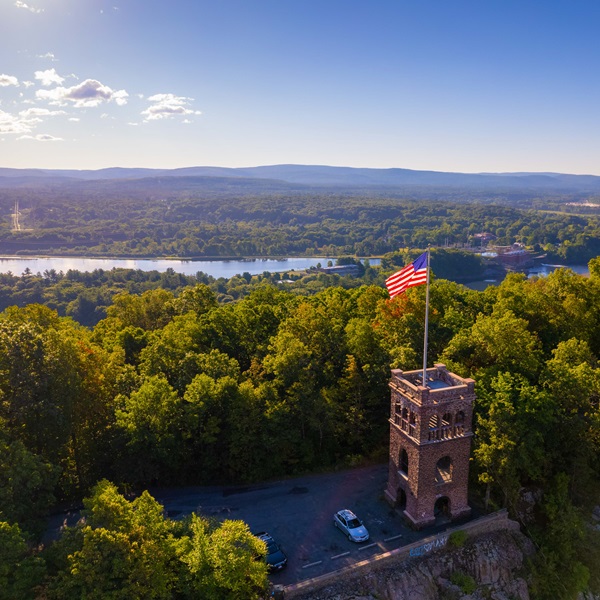 Poet's Seat Tower, a sandstone observation tower built in 1912, offers panoramic views of the Connecticut River Valley and the surrounding hills. 