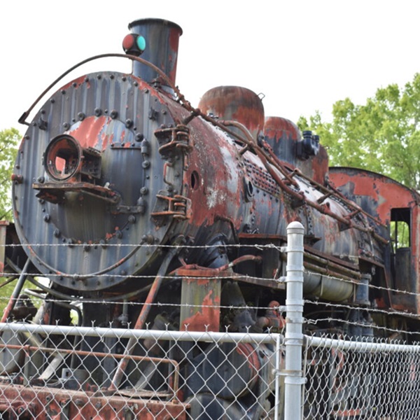 Dora has a history tied to the coal mining industry, which played a significant role in the town's development and some remnants of this history can still be found in the area. 