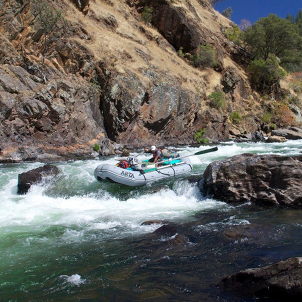 As rafters navigate rapids, they are treated to breathtaking views of the surrounding Sierra Nevada Mountains, its lush forests, and granite cliffs along the remote and pristine wilderness of the Tuolumne River. 