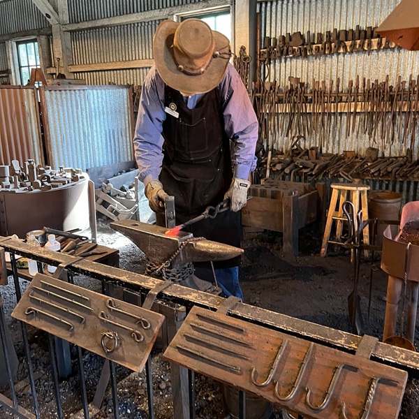 The park features a working blacksmith shop where demonstrations are often held and visitors can watch blacksmiths at work. 