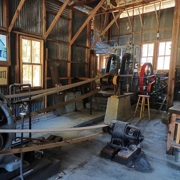 The settlement included residential buildings, a bakery, a general store, a printing press, and other facilities necessary for communal living. 