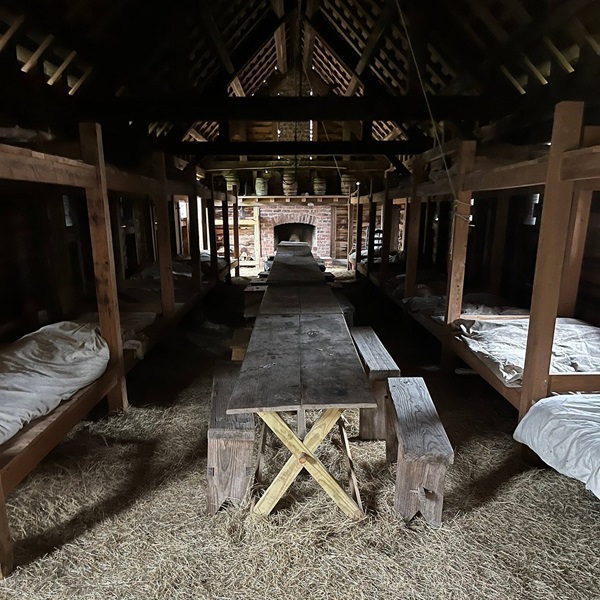 Visitors to the site can explore reconstructed buildings, including the barracks, officers' quarters, and blockhouse. 