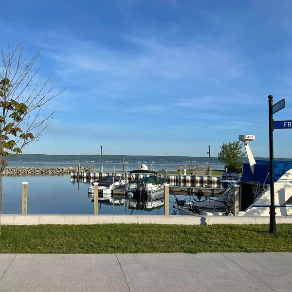 Visitors can enjoy scenic drives along the bay, relax on sandy beaches, or explore nearby islands such as Huron Bay and Huron Islands. 
