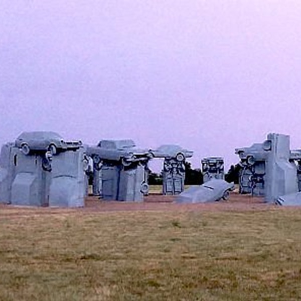 Set in the open plains of Nebraska, offering a stark and striking contrast between the man-made structure and the natural landscape. 