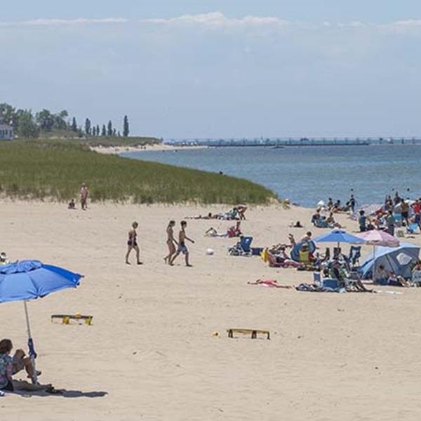 Silver Beach is a popular destination with its sandy shores, splash pad, and scenic pier, perfect for swimming, picnicking, and enjoying the outdoors. 