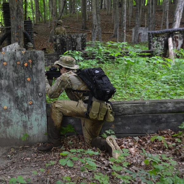 Hole in the Wall Paintball features a variety of paintball fields, including wooded areas and open spaces, designed to accommodate different playing styles and scenarios. 