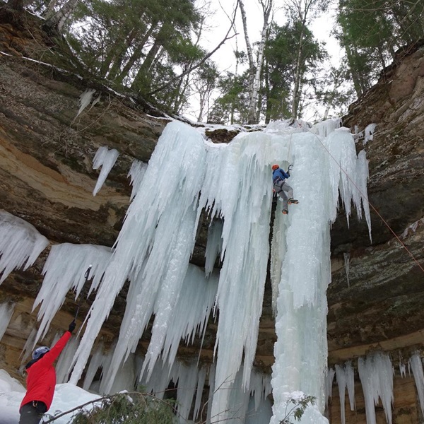 Miners Falls, a 40-foot waterfall located in the national lakeshore, is accessible via a short hike through a forested trail and is spectacular during winter. 