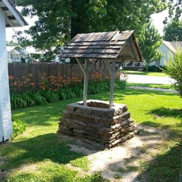 The home is located in a scenic park setting, perfect for a stroll after the tour. 
