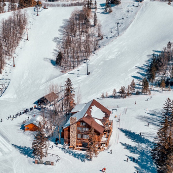 The ski area offers a variety of terrain, with gentle runs for novices and more challenging trails for experienced skiers and snowboarders. 