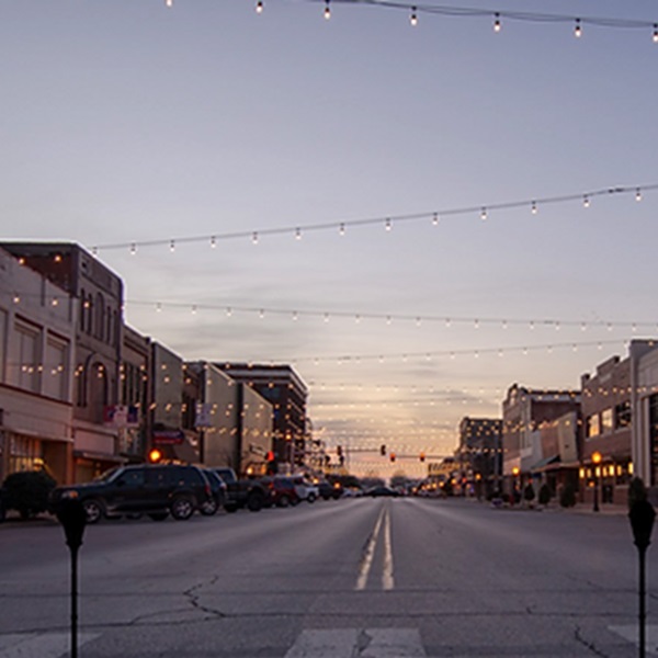 The downtown area features a mix of historic buildings, local shops, restaurants, and occasional community events, providing a vibrant atmosphere for visitors. 
