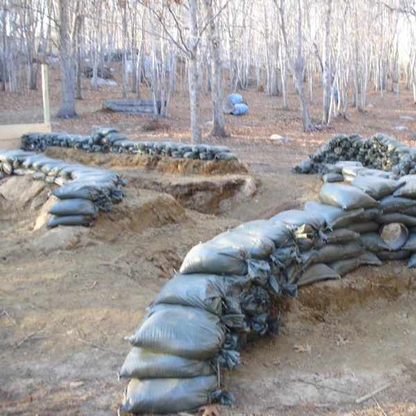Warzone Paintball & Airsoft Park features a diverse range of terrains, including wooded areas, open fields, and strategically designed obstacle courses to enhance gameplay. 