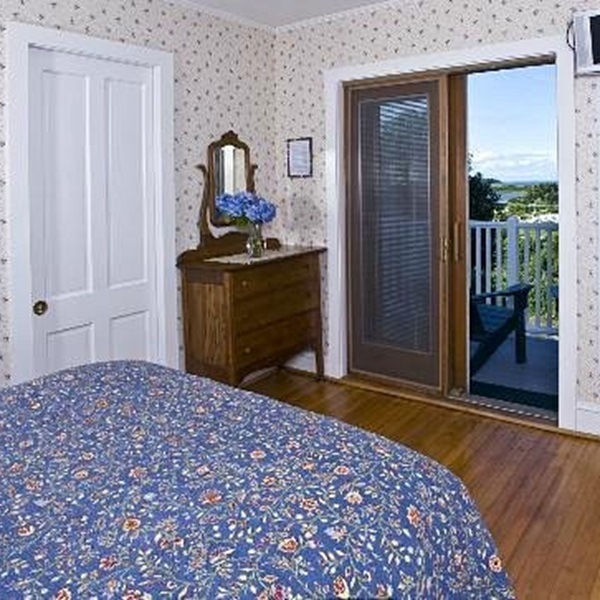 Rooms often include amenities like private baths and comfortable beds, and some have private balconies or views of the water. 