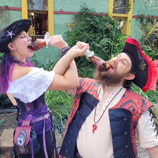 Visitors can indulge in a variety of hearty fare such as turkey legs, meat pies, and roasted nuts, as well as sweet treats like pastries and mead. 