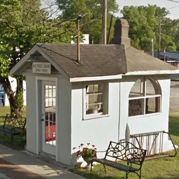 The World's Smallest Police Station measures just four feet by eight feet and holds its original furnishings of a desk, a chair, and a telephone. 