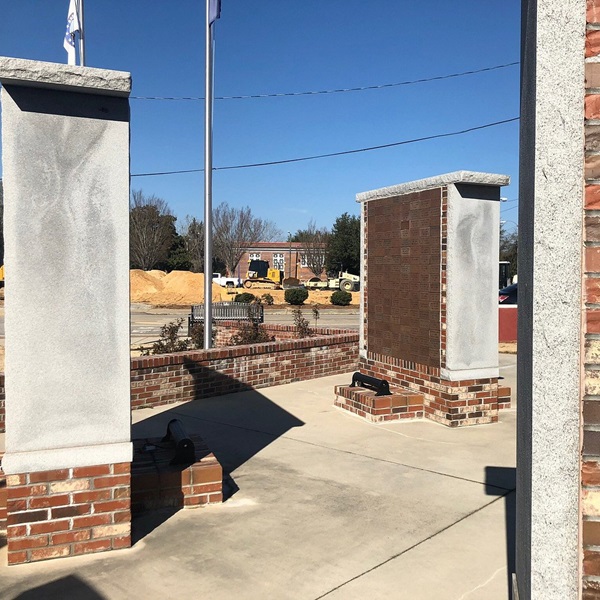 The Veteran's Memorial in Darlington pays tribute to local veterans who have served in various military conflicts, honoring their sacrifice and service. 