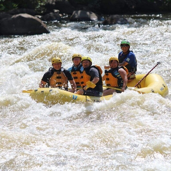 The Upper Pigeon River offers adrenaline-pumping rapids like Powerhouse, Lost Guide, and Roller Coaster, while the Lower Pigeon River features more gentle rapids suitable for families and beginners. 